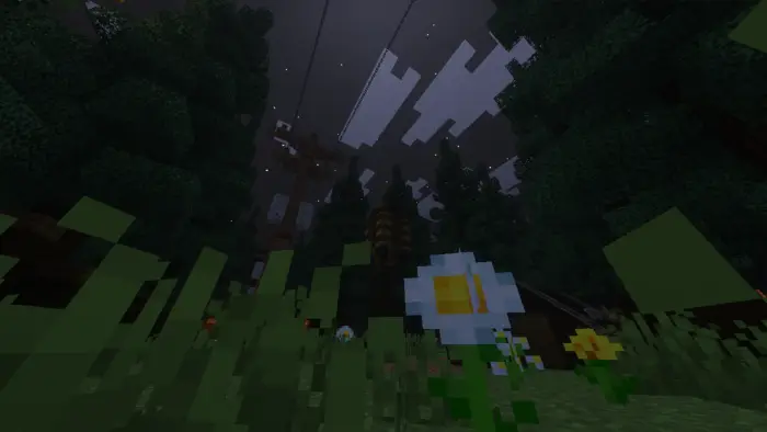 Dark forest with flowers under a cloudy sky