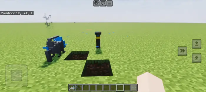Robot and device on grassy terrain, two holes