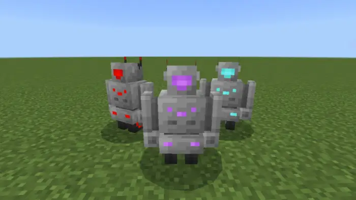 Three blocky robots with glowing lights on grass