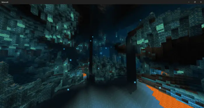 Glowing blue underground cavern with lava flows