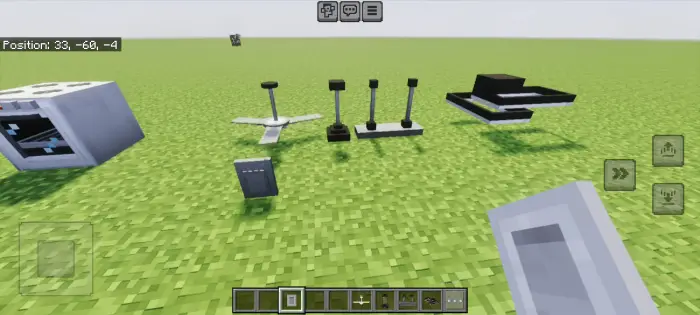 Assorted modern furniture items on grass.