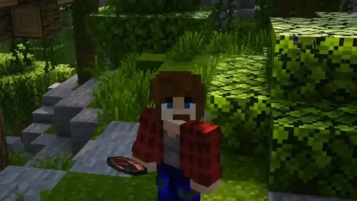 Player holding compass in lush forest path