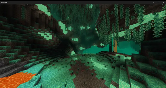 Lush glowing cavern with hanging vines