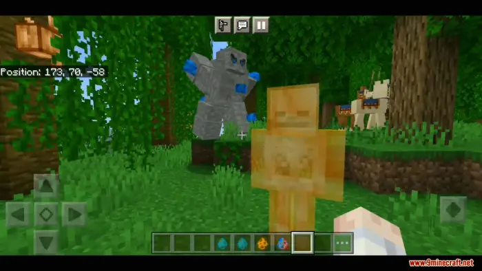 Stone and gold golems in a forest clearing