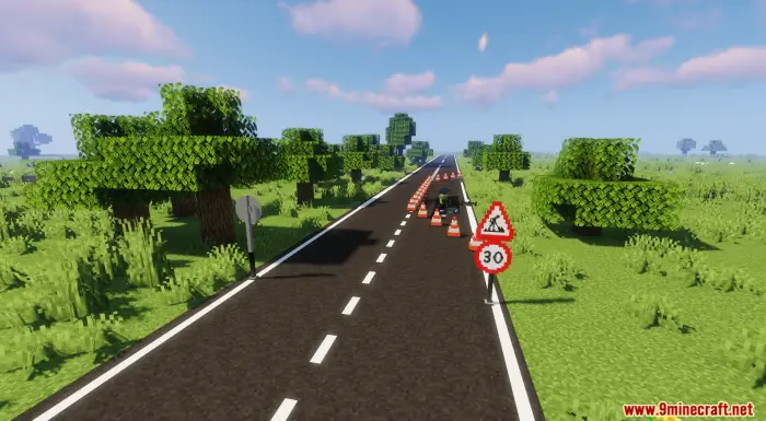 ALT text Road signs and cones on rural road