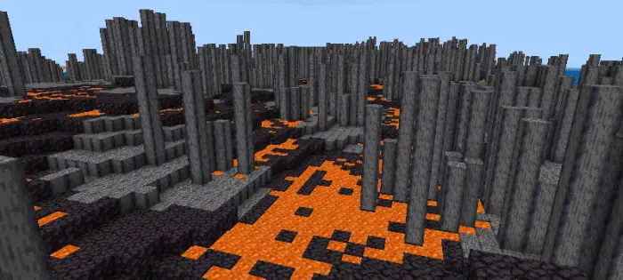 Basalt columns rise above flowing lava pools.