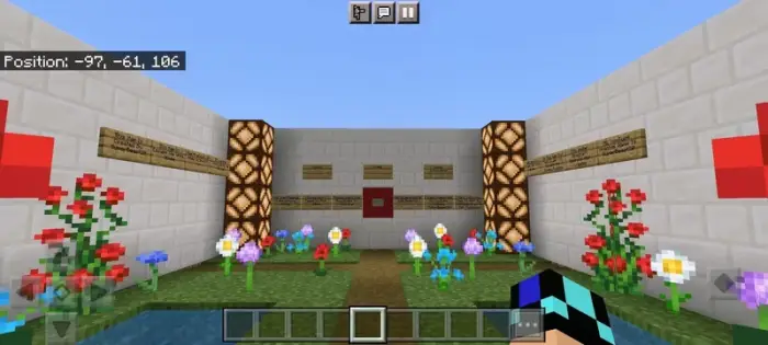 Garden courtyard with signs and flowers