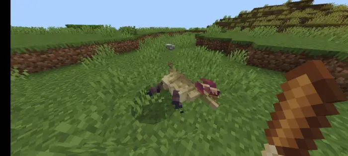 Blocky prehistoric creature in grassy field