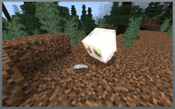 Tiny glowing ghost floating above dirt ground