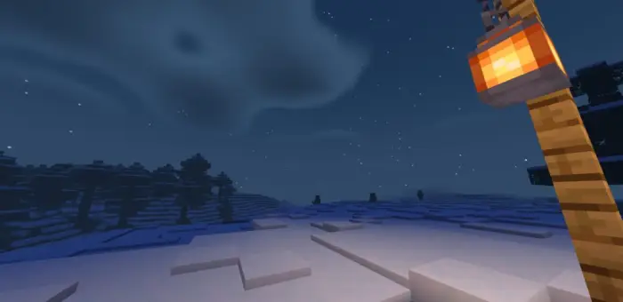 Snowy landscape with soft lighting at night