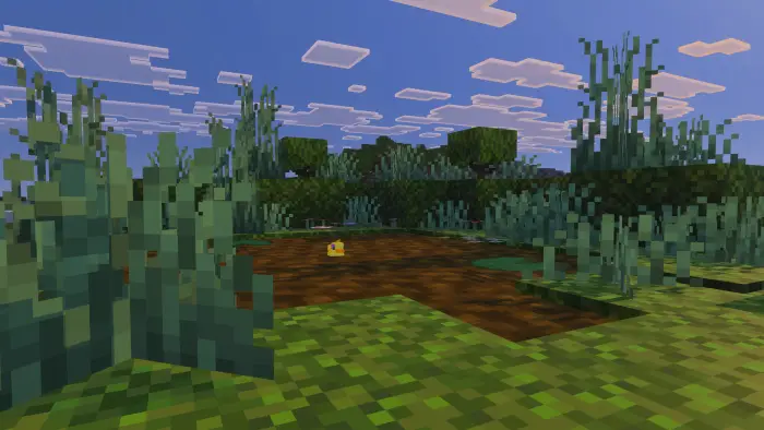 Rubber duck floats in a pixelated pond.