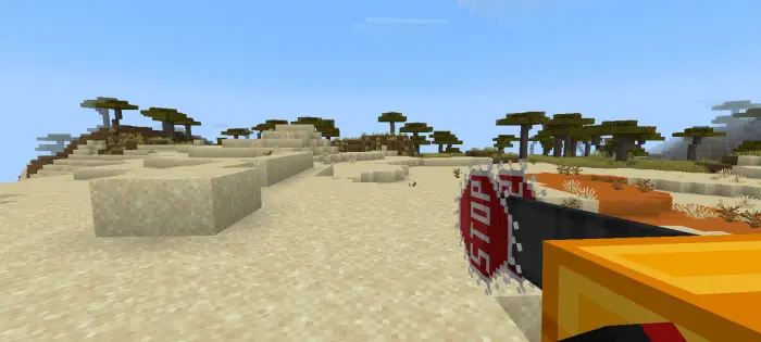 Chainsaw weapon held in sandy savanna biome