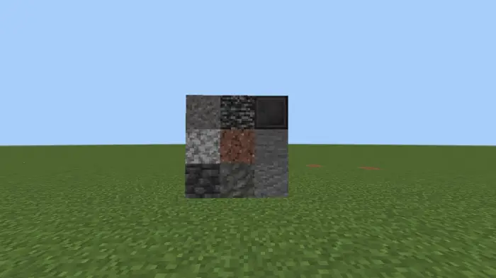 Netherite-themed stone blocks on grass