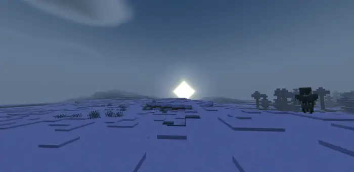 Soft sunset lighting on a snowy landscape