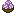 Purple speckled egg item on a tray