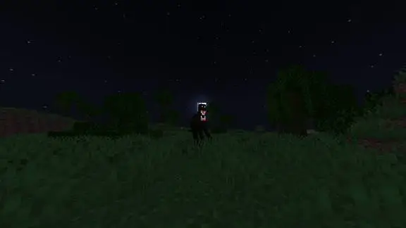 Dark entity with glowing eyes in a field