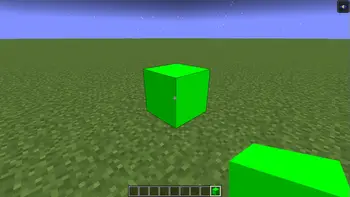Bright green block on grassy terrain