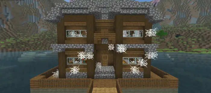 Spruce house with cobwebs on lake island