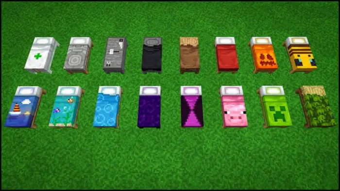 Sixteen colorful custom beds on grass.