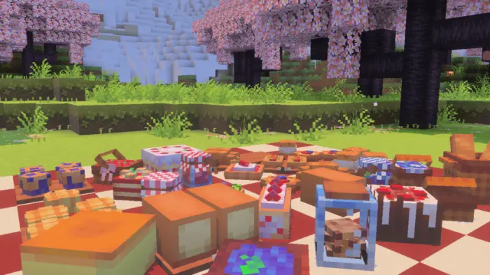 Pastry-themed picnic items on a blanket