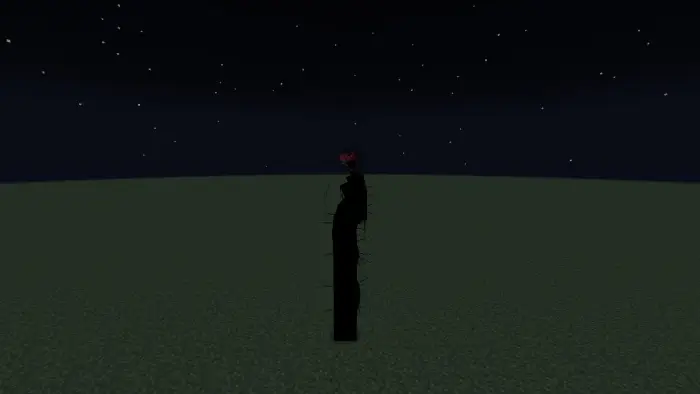 Tall shadowy creature under night sky