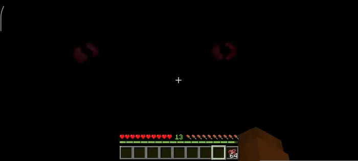 Glowing red eyes in a dark game scene