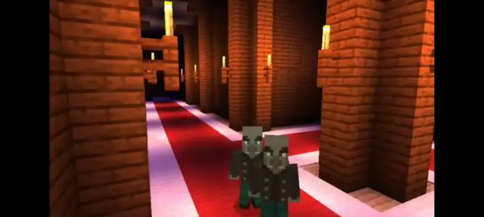 Two animated mobs in a torch-lit hallway