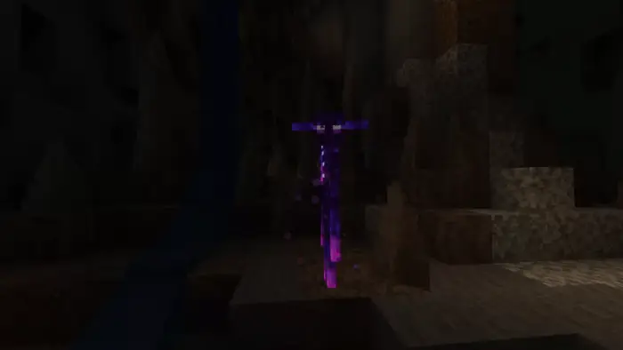 Glowing purple Enderman in a dark cave