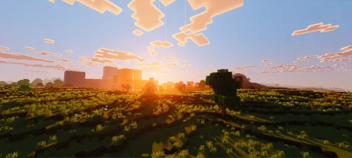 Vibrant sunset over blocky landscape