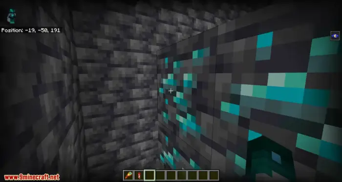Diamond ore blocks in a dark stone cave