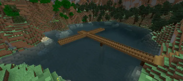 Wooden fishing pier crosses a central lake.