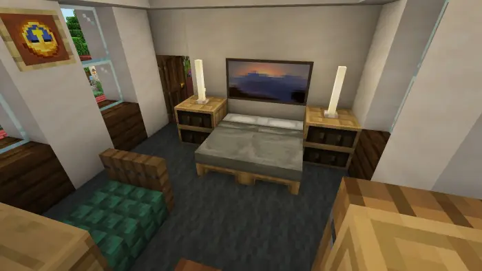 Cozy bedroom with bed, art, and candles