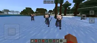 Three dinosaur creatures on snowy terrain