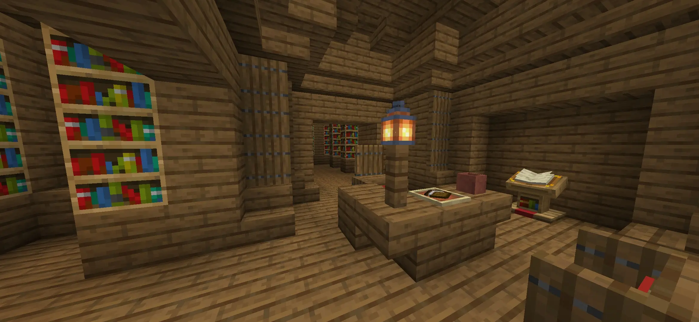 Wooden library room with bookshelves and desk