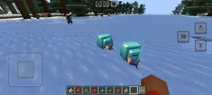 Two small blue dinosaur creatures on ice