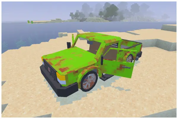 Blocky green abandoned truck on sandy shore