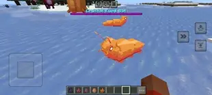 Orange dinosaur creatures on icy terrain