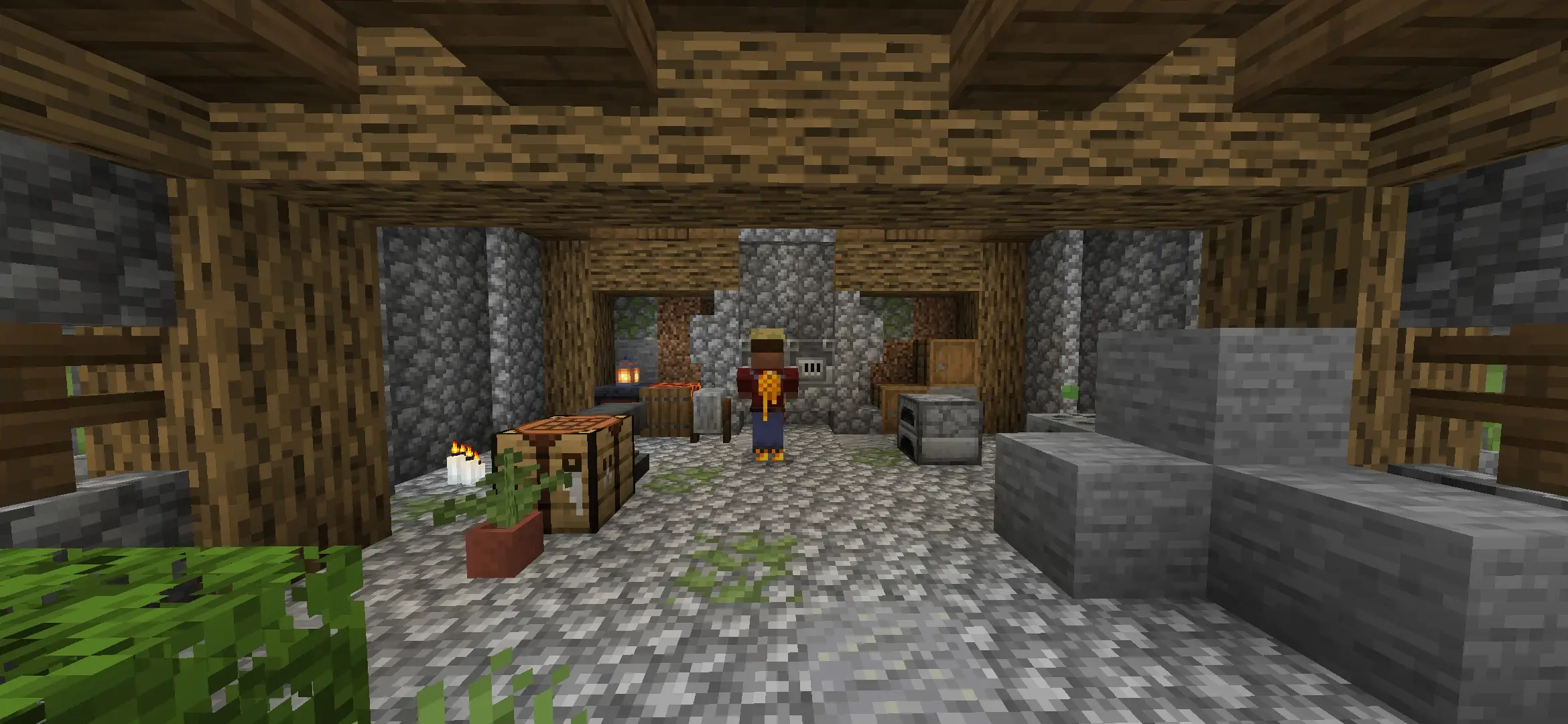 Stone room with crafting table and villager