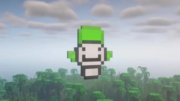 Pixelated totem with green and white face