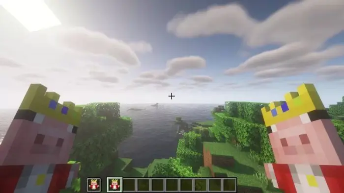 Two king pig totems held in-game