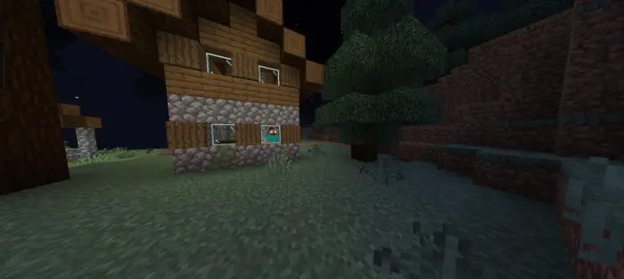 Cabin at night with eerie forest nearby