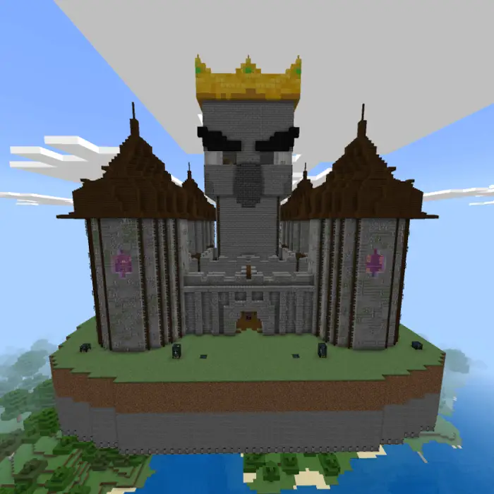 Castle with a crowned statue face structure