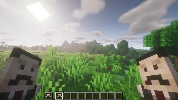 Pixelated totems with mustaches in a field