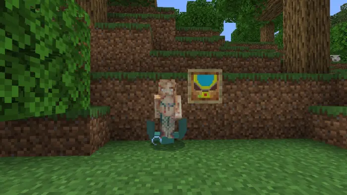 ALT Snake goddess figure near a framed amulet