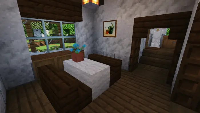 Cozy dining nook with potted plant and window