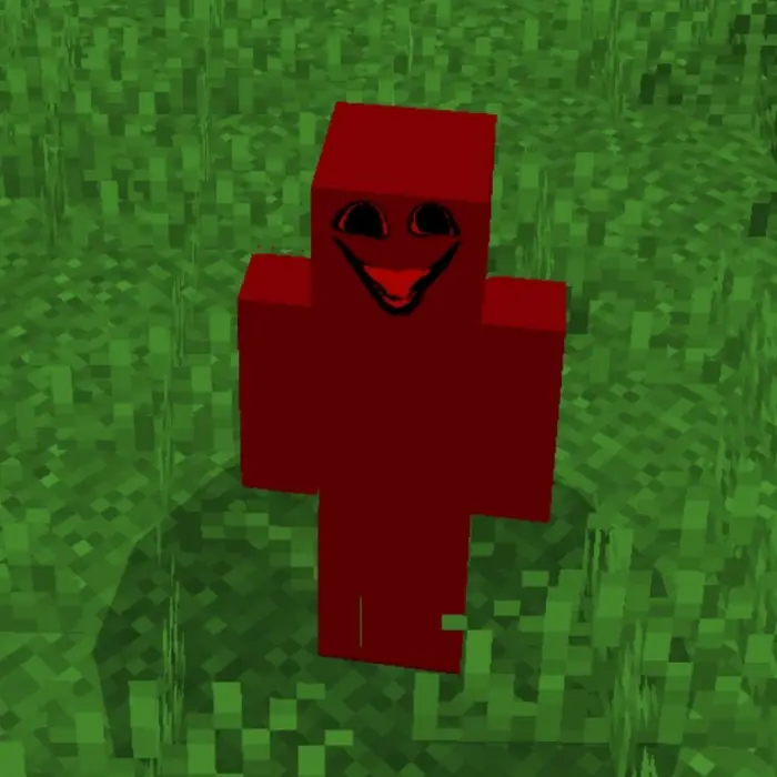 Blocky red monster with creepy smile.