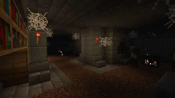 Underground stone dungeon with cobwebs and torches