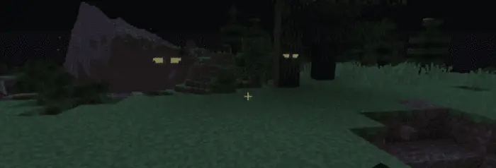 Glowing eyes peer from the nighttime shadows.