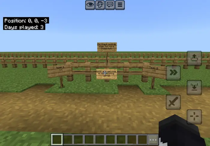 Wooden arena with team signs and fences