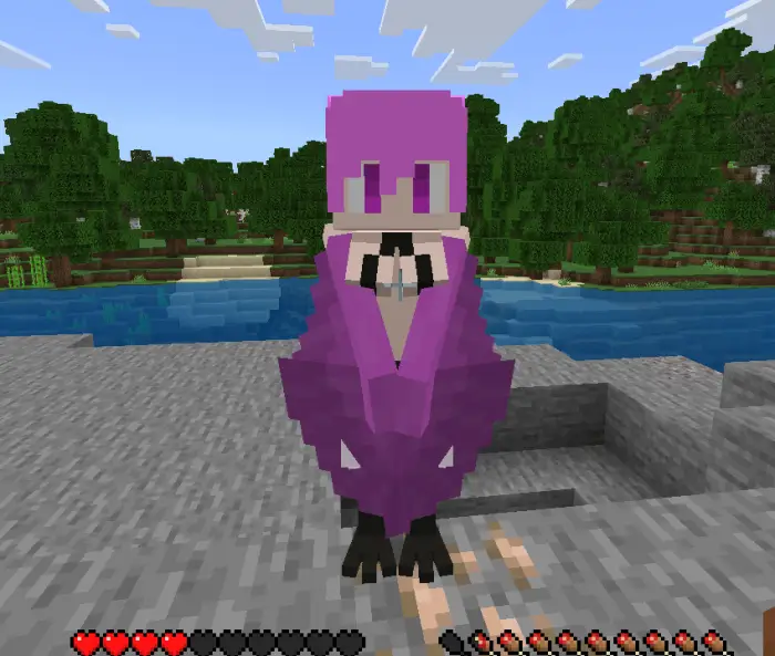 Purple spider hybrid creature on stone shore